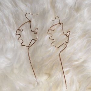 Face-shaped earrings